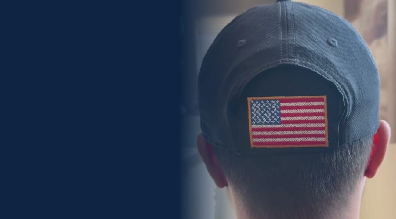 Back of a ball cap with an American flag Kap-Bak filling the gap