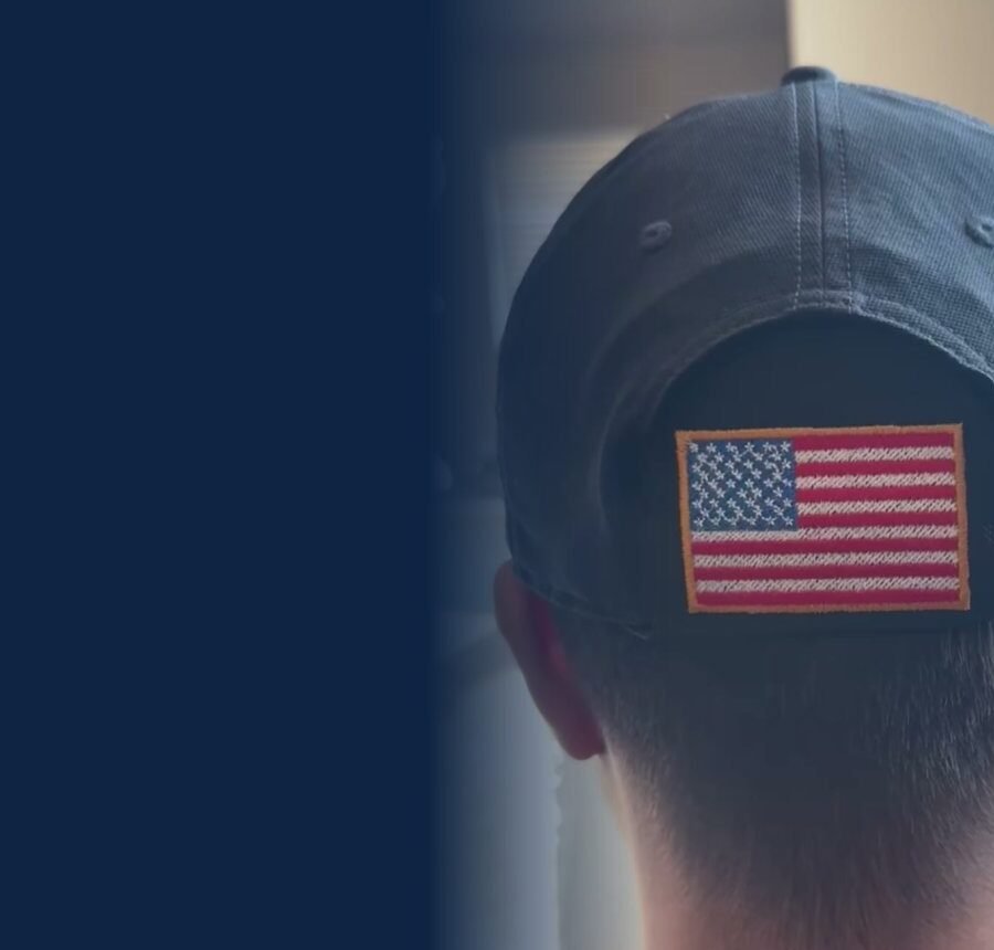 Back of a ball cap with an American flag Kap-Bak filling the gap